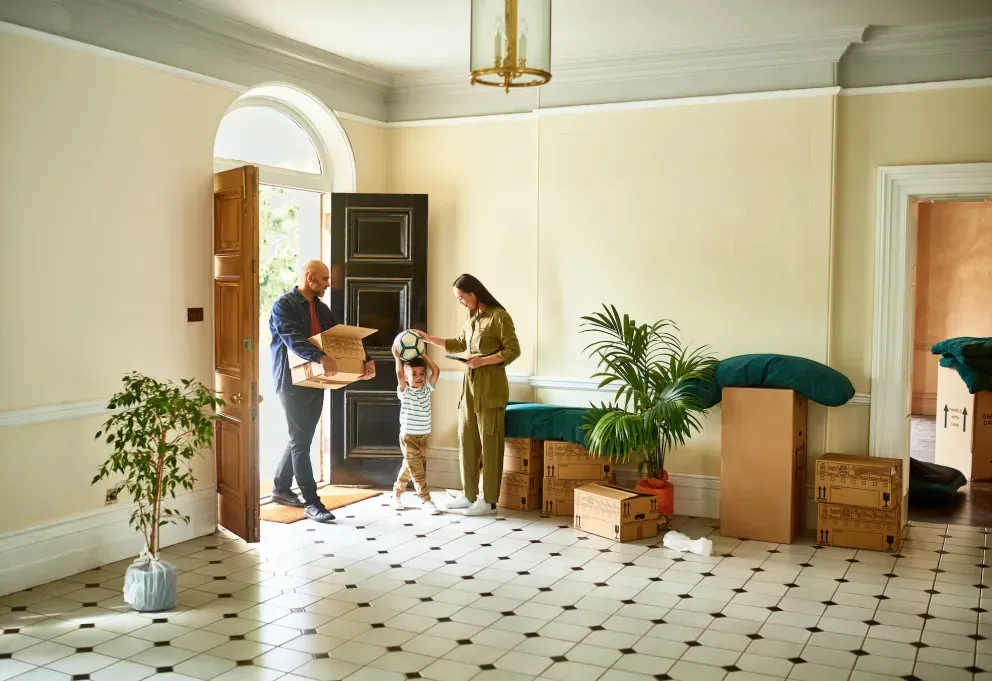Woman exercising on treadmill in bright home gym with plants and checkered floor Woman exercising on treadmill in bright home gym with plants and checkered floor
