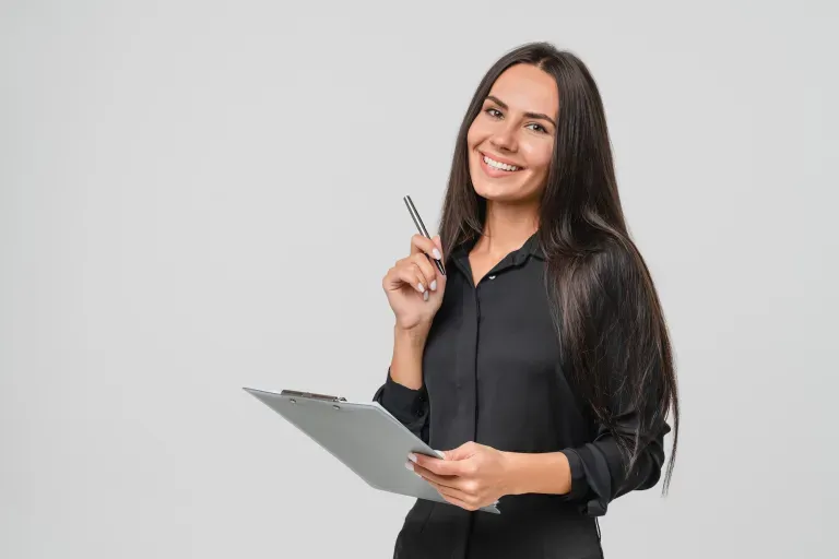 Young business woman with pen and clipboard Young business woman with pen and clipboard