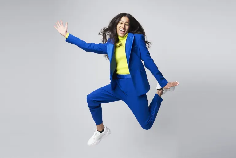 Excited business woman jumping Excited business woman jumping