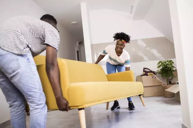 people moving sofa into new house people moving sofa into new house