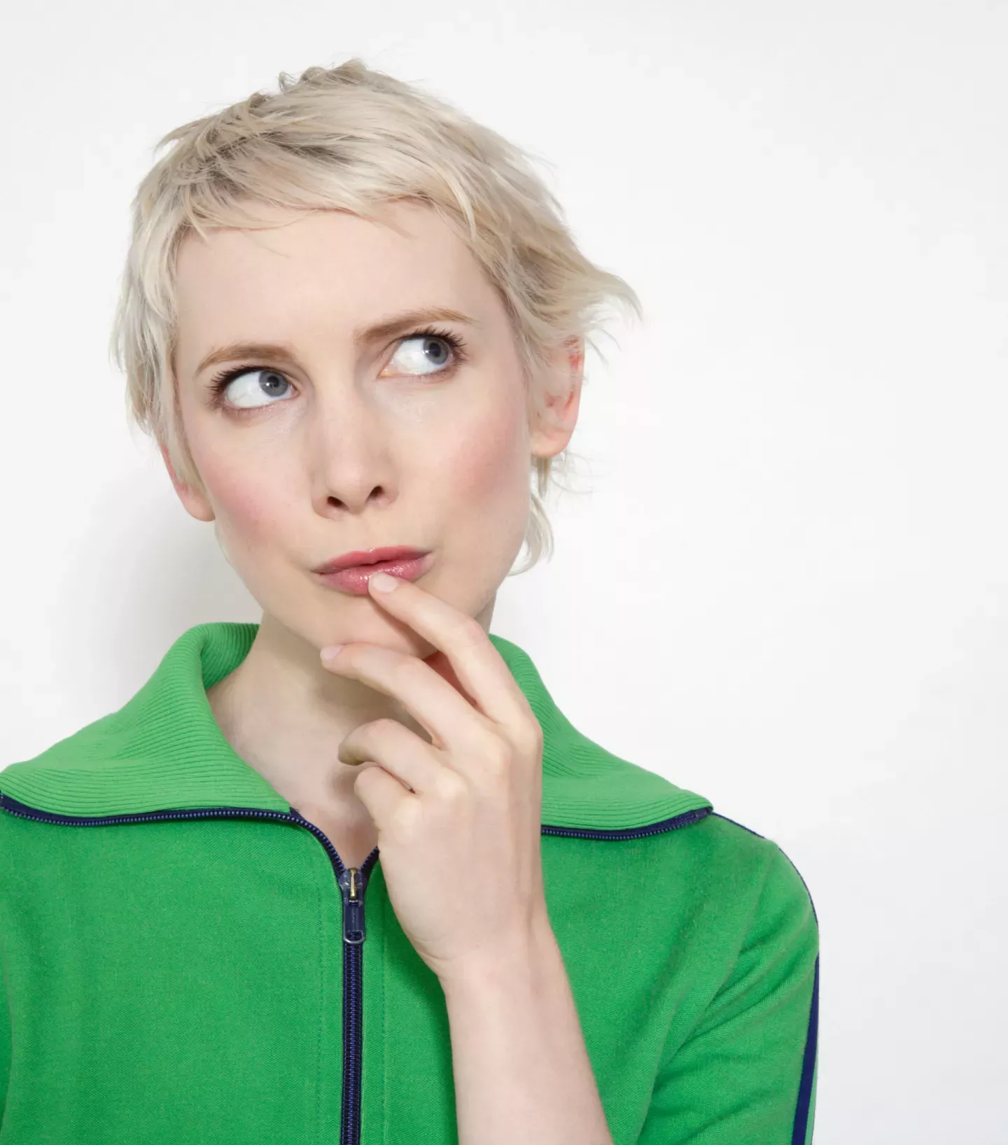 Woman in a green sweater thinking Woman in a green sweater thinking