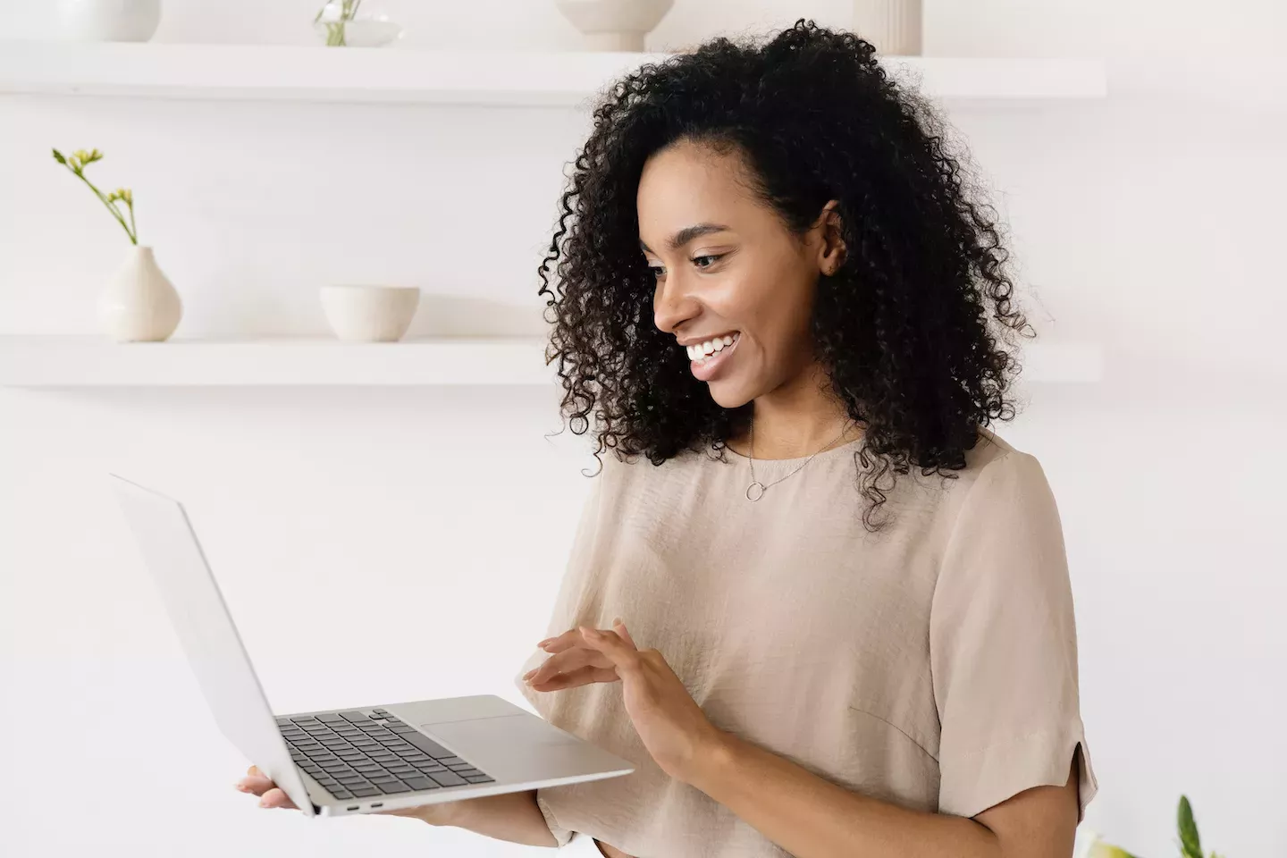 Woman looking at laptop Woman looking at laptop