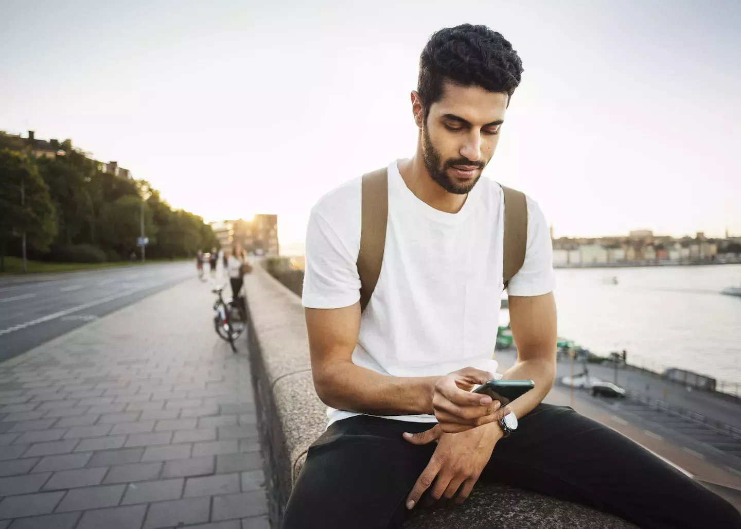 Man checking his phone Man checking his phone