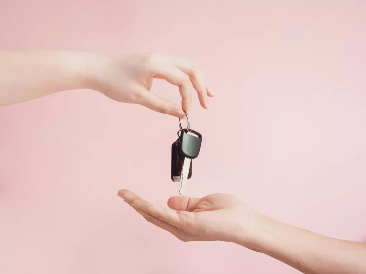 Hands holding keys Hands holding keys