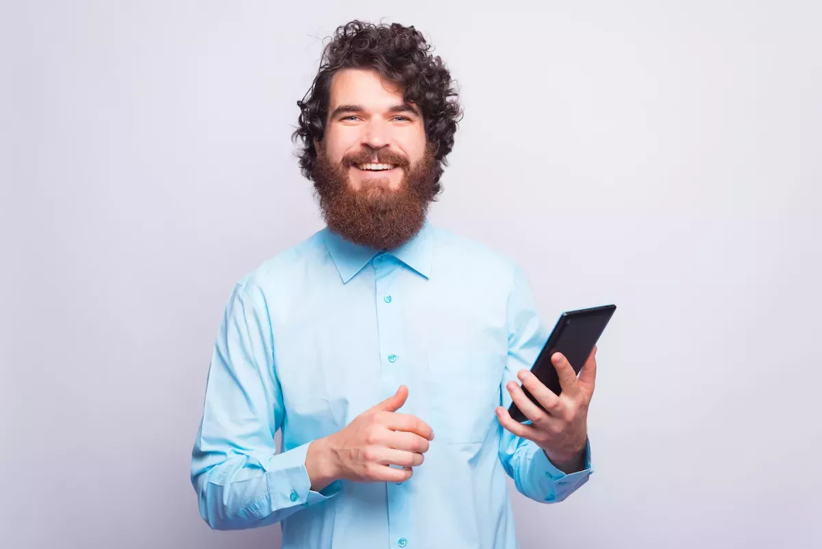 Business man holding a tablet Business man holding a tablet
