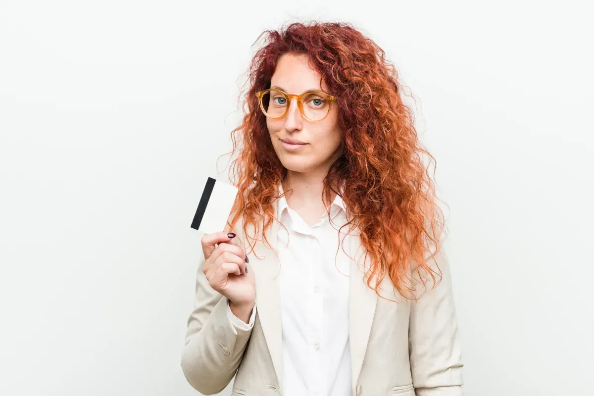 Woman holding credit card Woman holding credit card