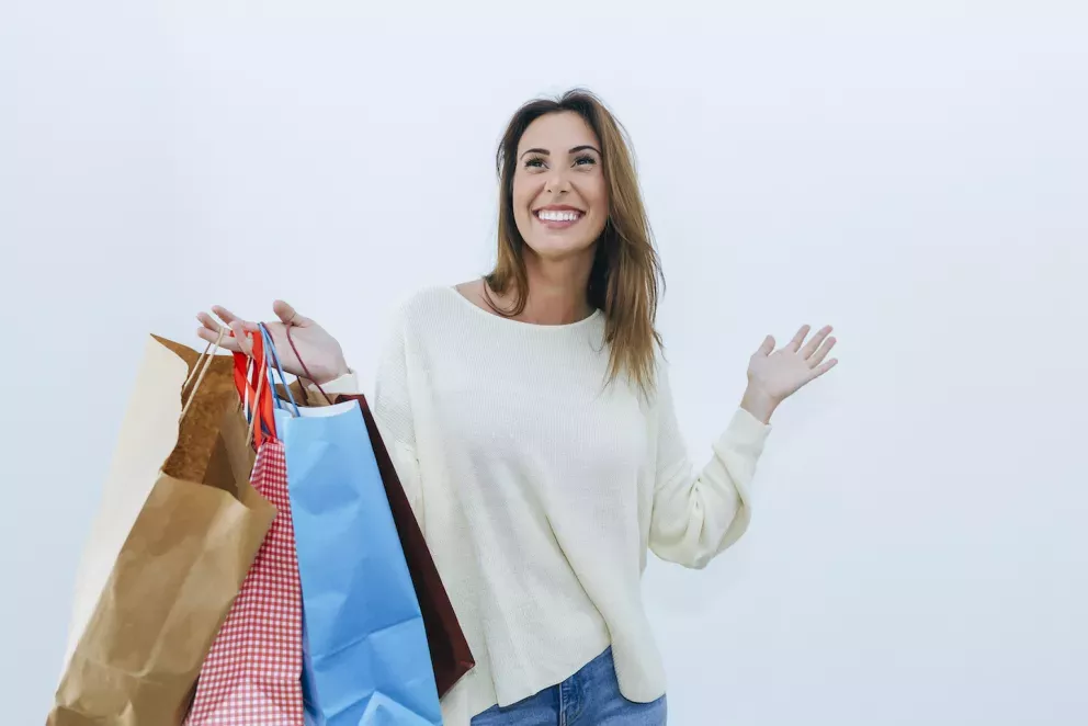 holding shopping bags holding shopping bags