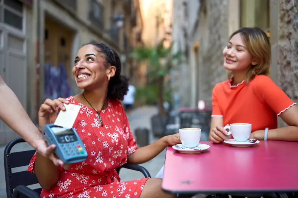 Woman paying with card Woman paying with card
