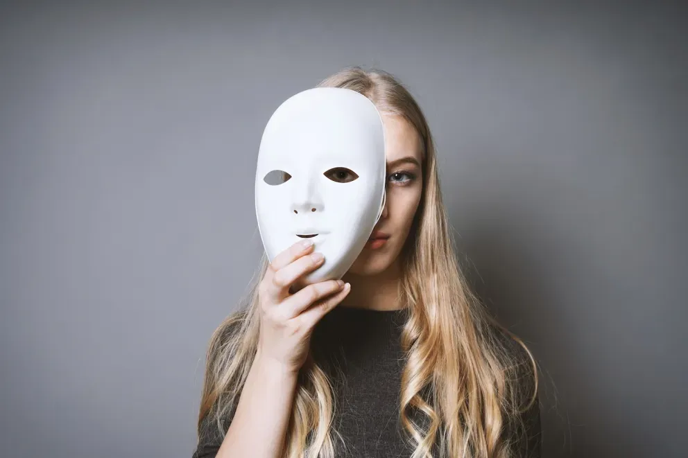 Blonde woman white mask fraud Blonde woman white mask fraud
