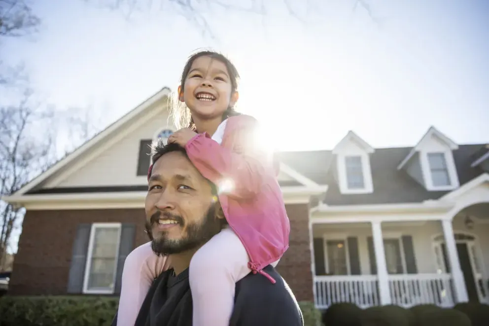 Happy father with smiling child on his shoulders. Happy father with smiling child on his shoulders.