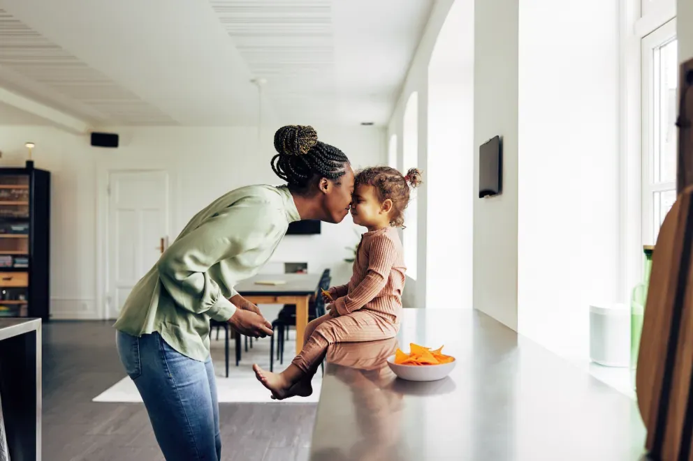 Parent and child in home Parent and child in home