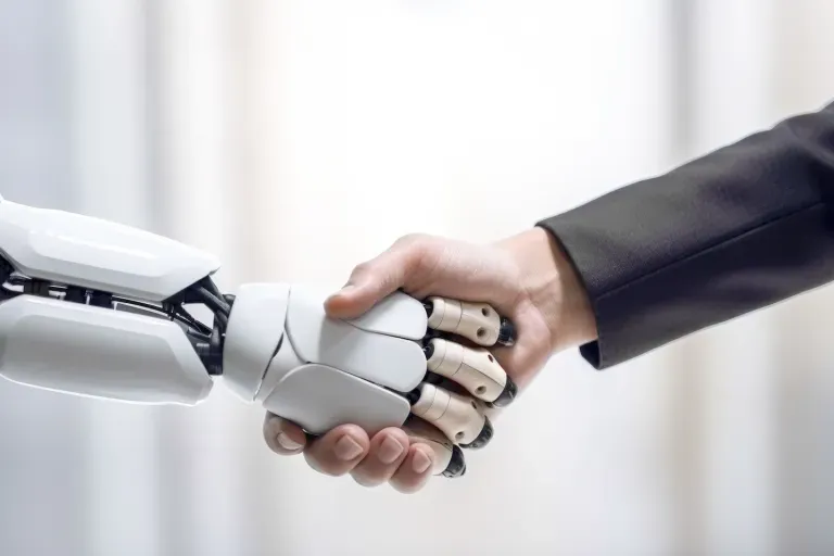 robot and human shaking hands robot and human shaking hands