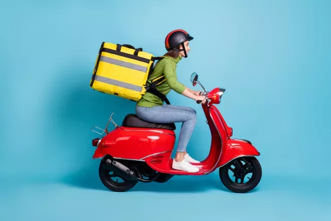 Person on scooter delivery Person on scooter delivery
