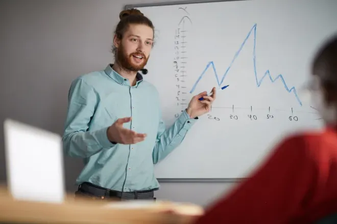 business person showing data business person showing data