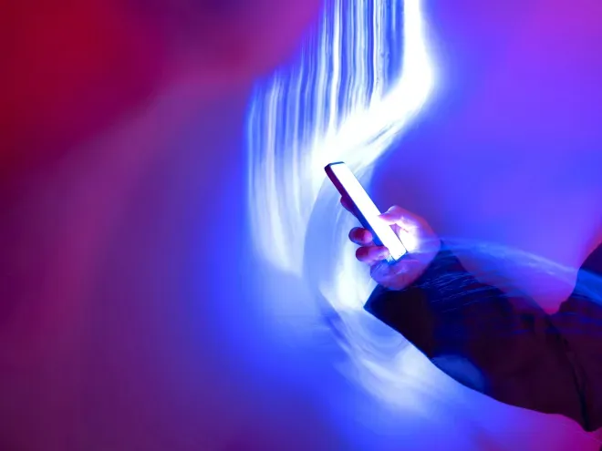 Hand holding phone Hand holding phone