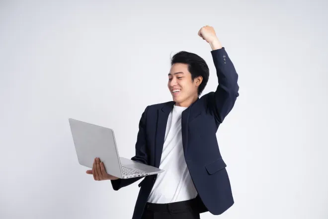 man with laptop excited expression man with laptop excited expression