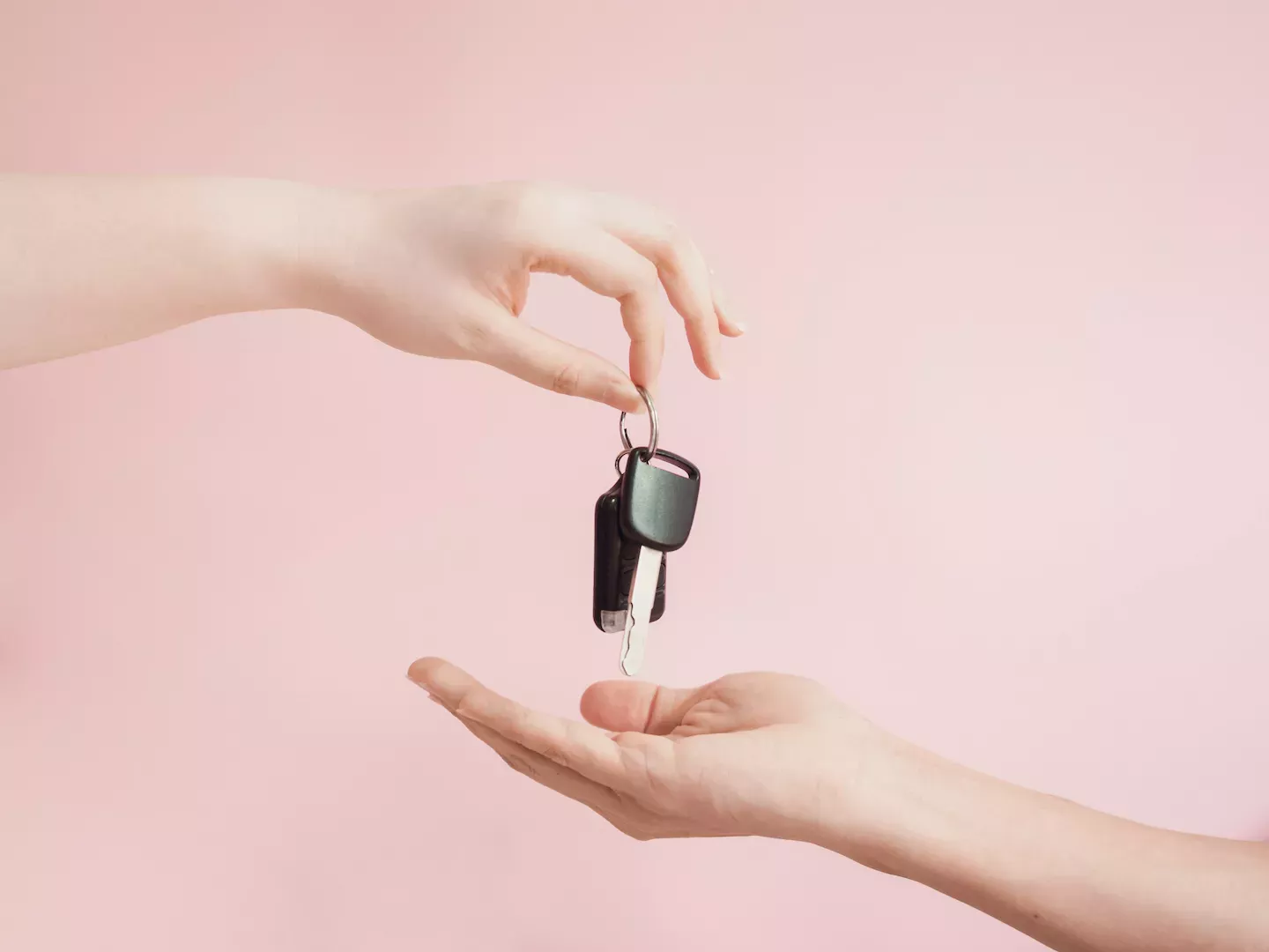 Hands holding keys Hands holding keys