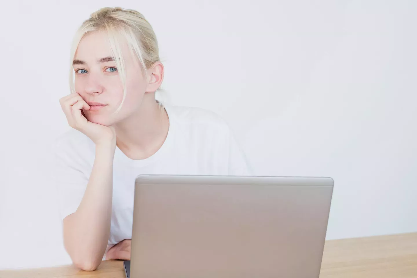 Woman looking up from her laptop Woman looking up from her laptop