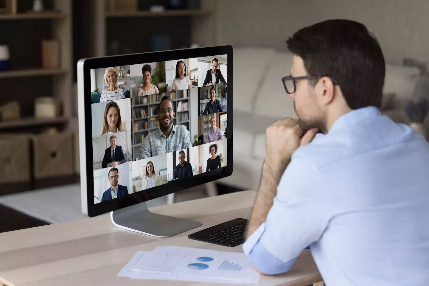 Banker in a virtual meeting Banker in a virtual meeting