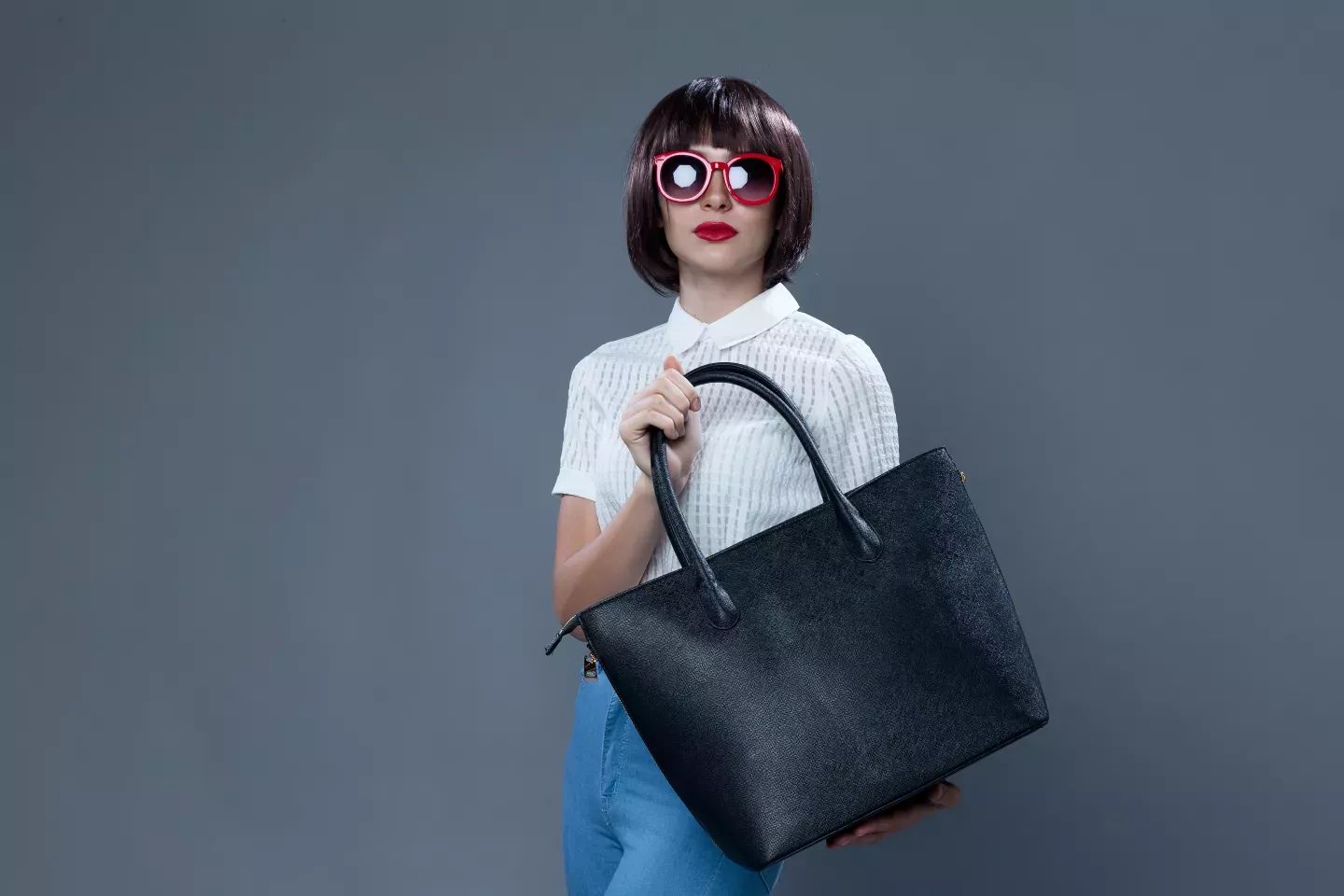 woman holding purse woman holding purse