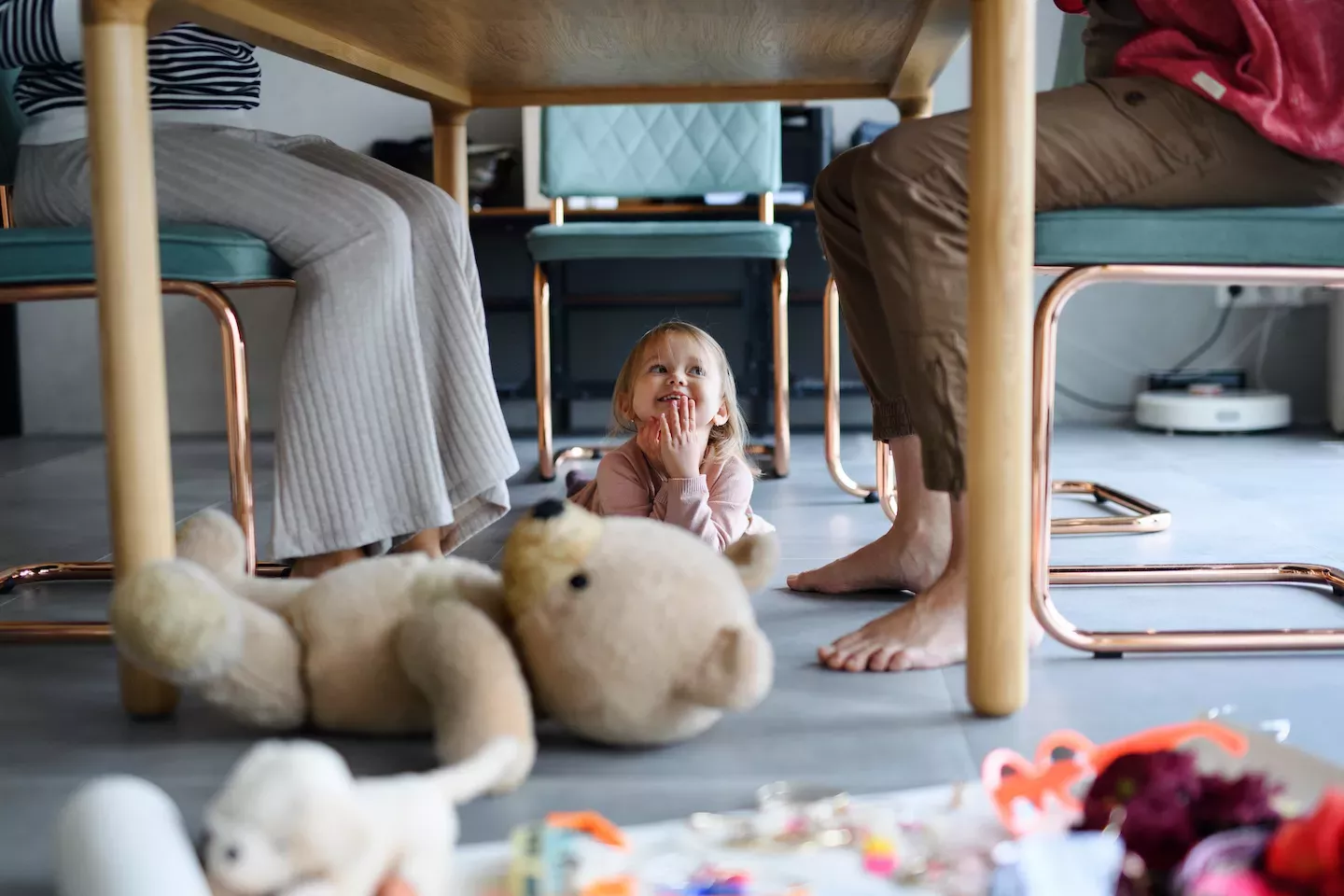 Child under the kitchen table Child under the kitchen table