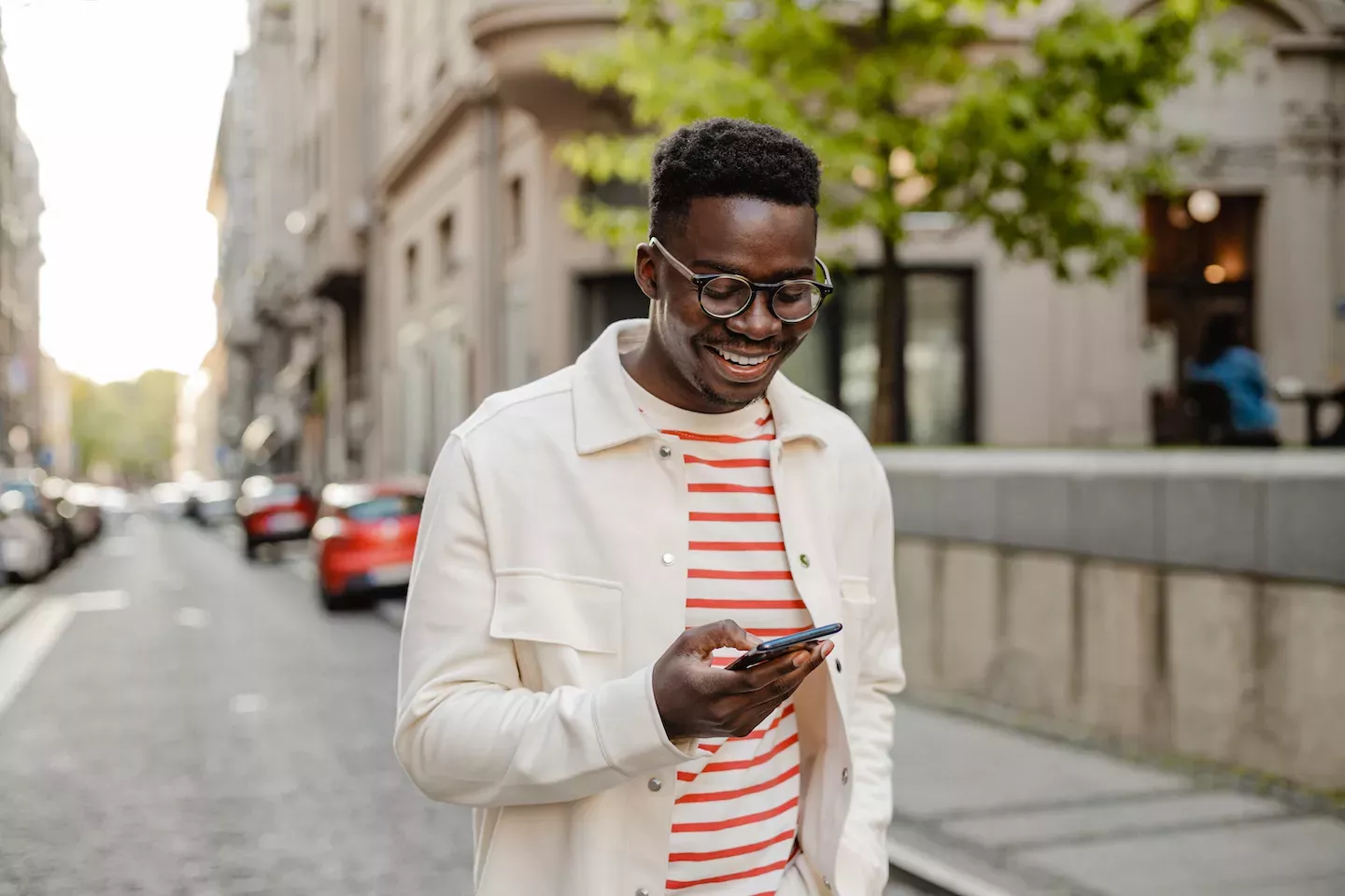Happy man using a phone Happy man using a phone