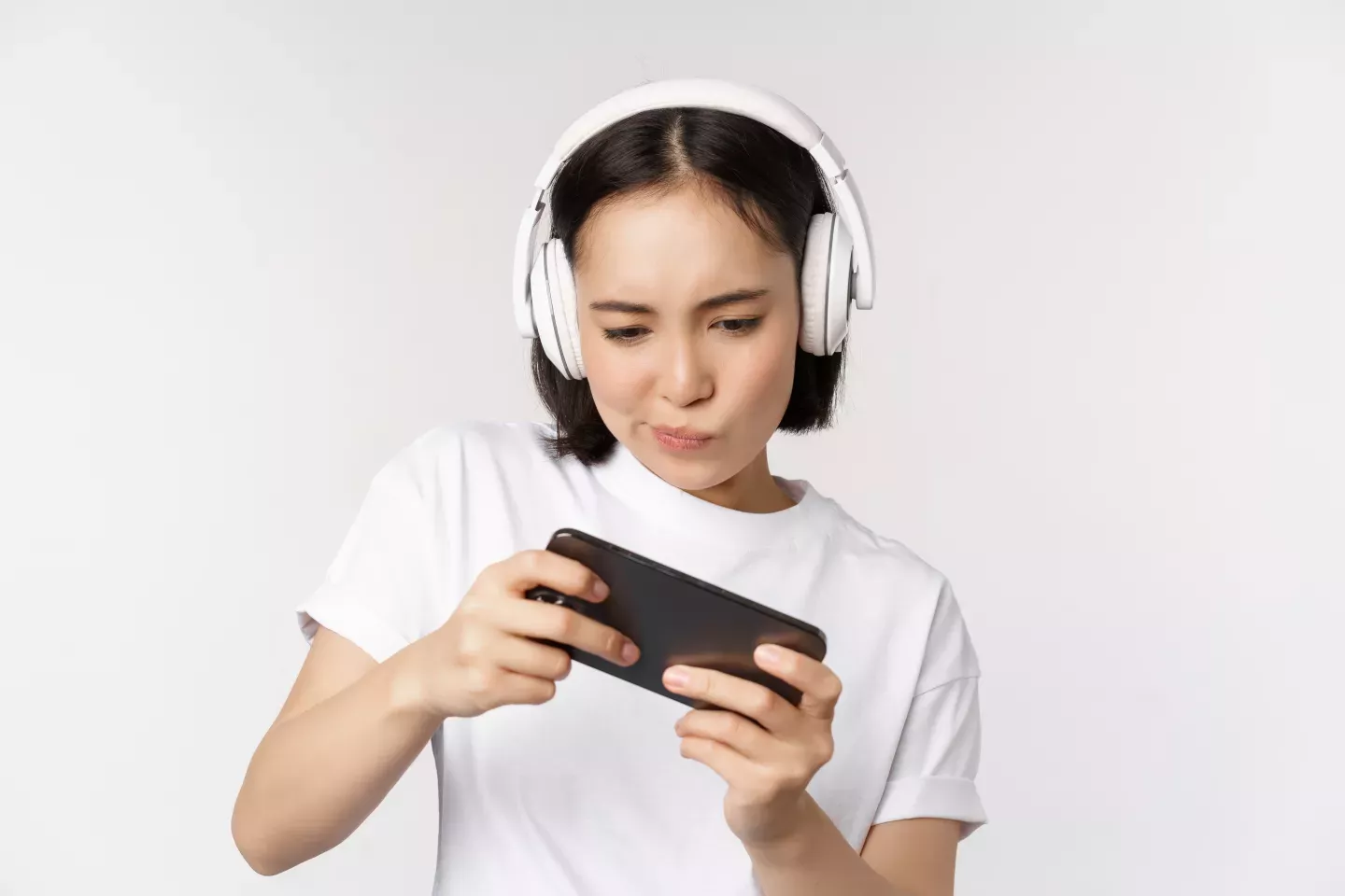 Girl playing on phone Girl playing on phone