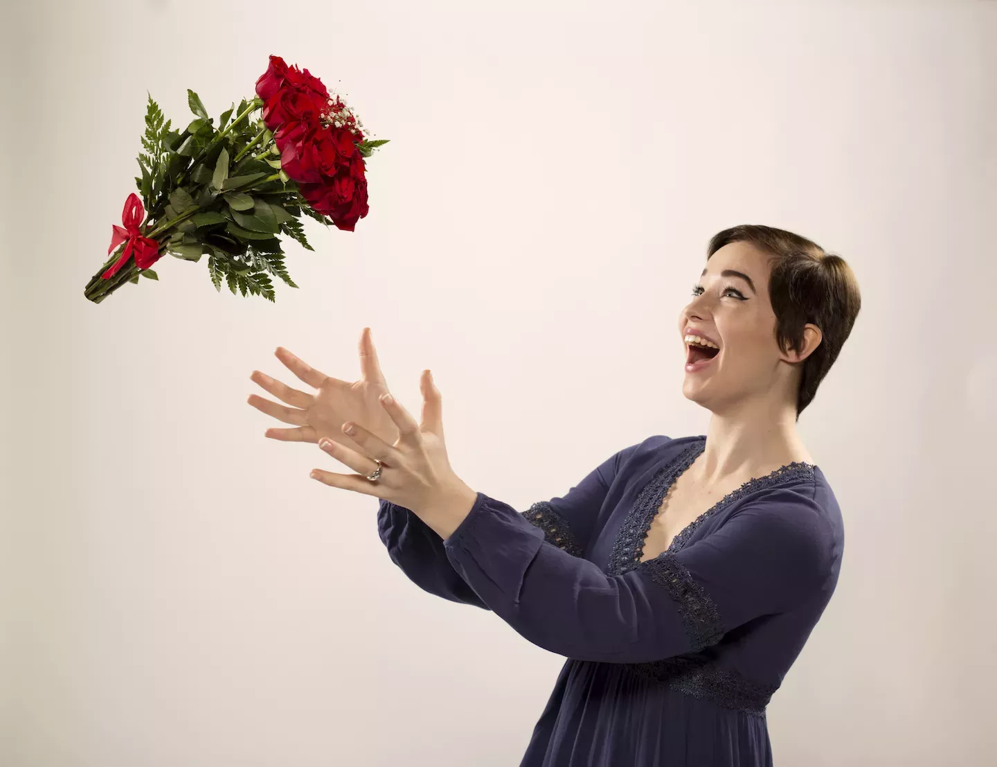 person catching flowers person catching flowers