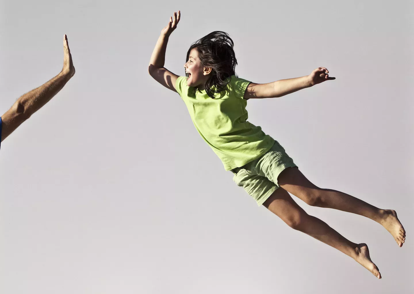 Kids giving a high five Kids giving a high five