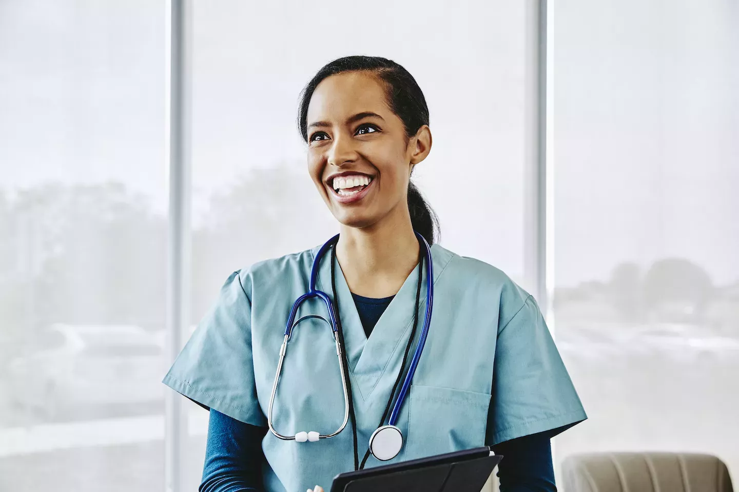 Happy doctor smiling at work Happy doctor smiling at work