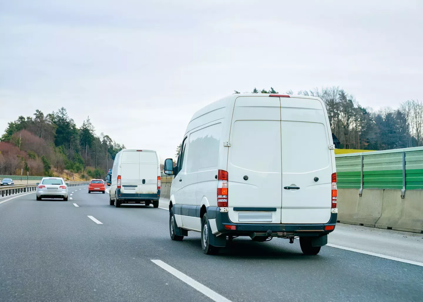 delivery vans on the road delivery vans on the road