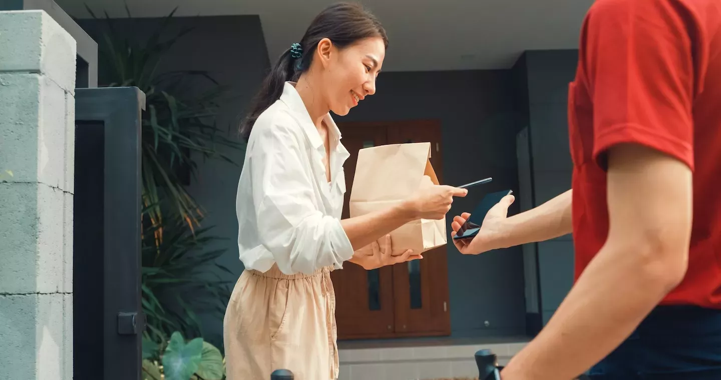 person receiving a package person receiving a package