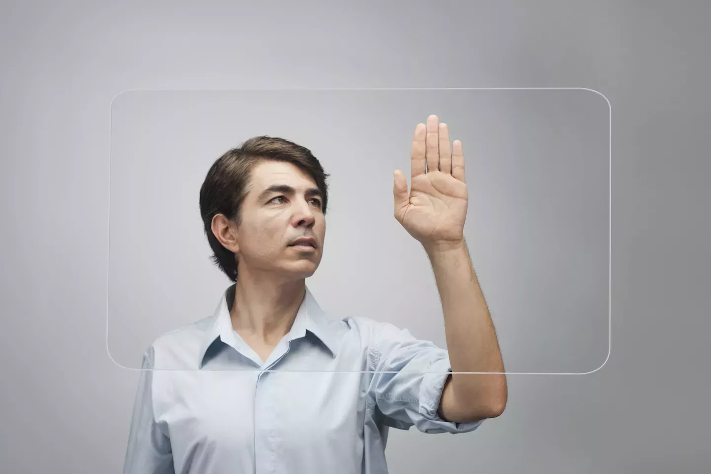 Man with hand up Man with hand up