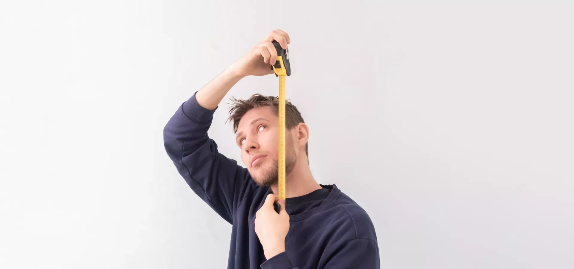 Man with tape measure Man with tape measure