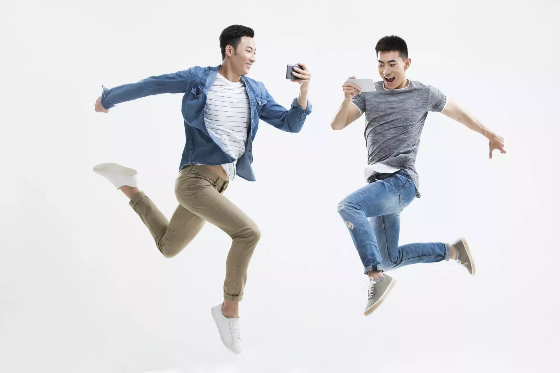 two men jumping two men jumping