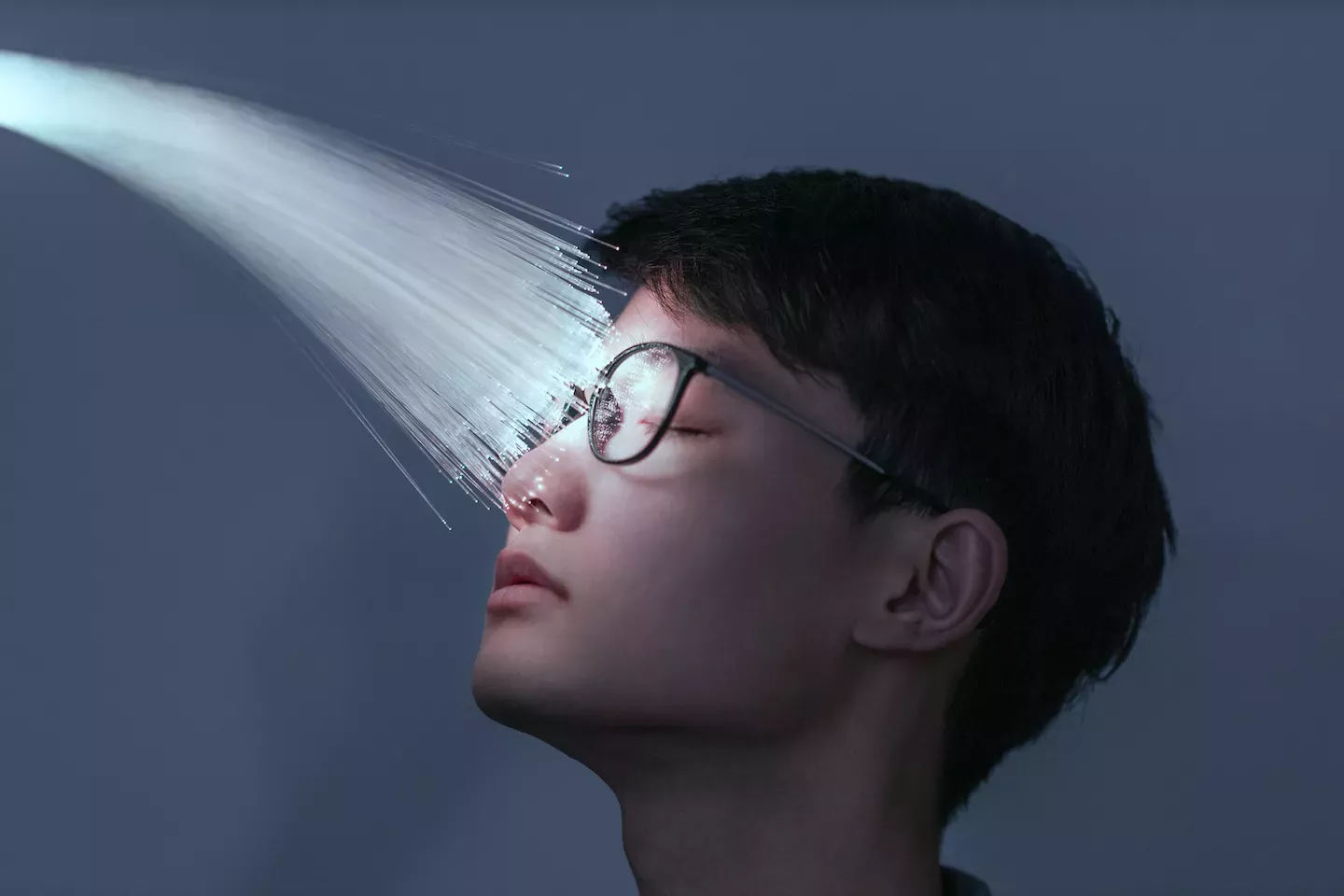 Man with light on face Man with light on face