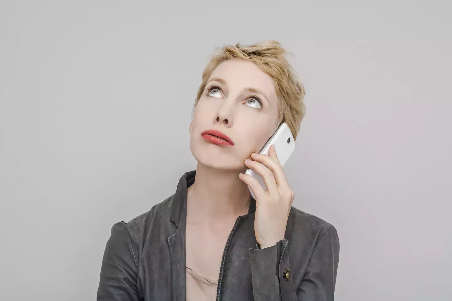 Impatient woman on the phone Impatient woman on the phone