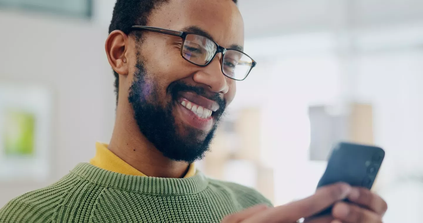 Person looking at phone Person looking at phone