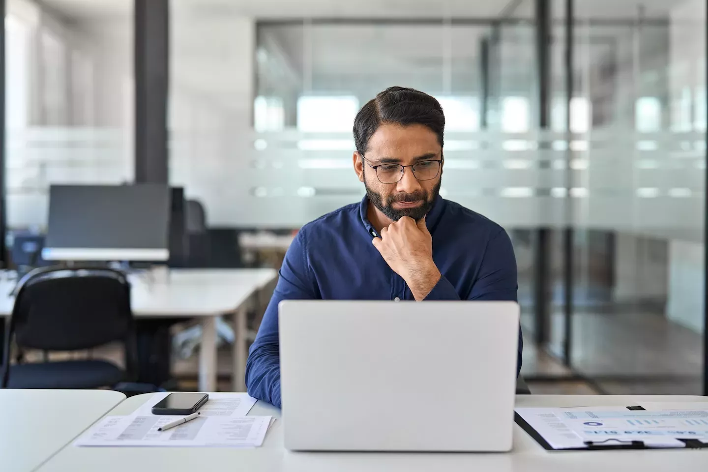 Man looking at computer Man looking at computer