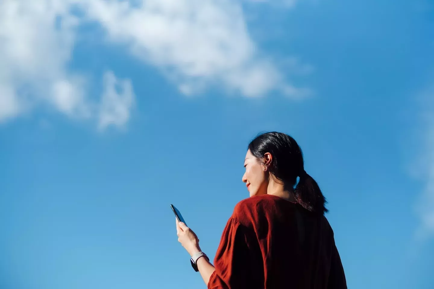 Person looking phone Person looking phone
