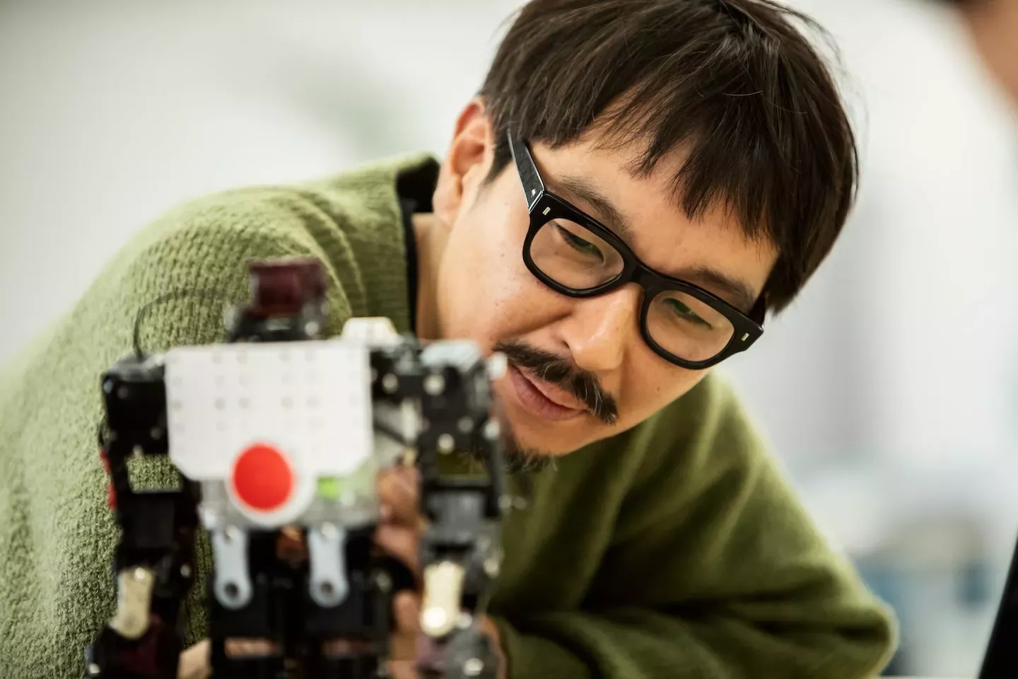 close up of a man working with technology close up of a man working with technology