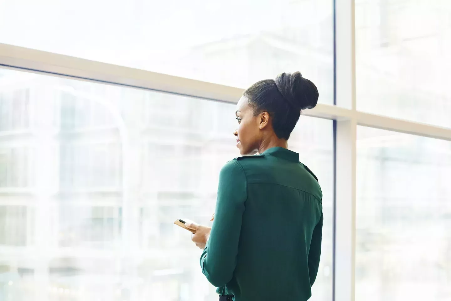 person looking out the window person looking out the window